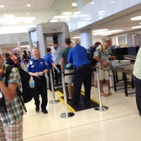 Photo taken at TSA Security Checkpoint C/D by Maddy H. on 7/23/2013