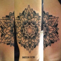 Photo taken at American Tattoo by AmericanTattoo A. on 3/23/2016