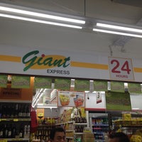 Photo taken at Giant Express by Carine C. on 7/20/2013