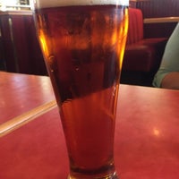 Photo taken at Red Robin Gourmet Burgers and Brews by Tom J. on 6/13/2015