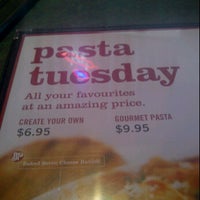 Photo taken at Boston Pizza by Elizabeth P. on 1/17/2012
