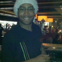 Photo taken at Houlihan&amp;#39;s by Sharon D. on 12/18/2011