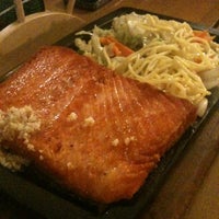 Photo taken at Koji Sushi by Fabiana R. on 3/4/2012