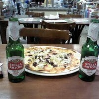 Photo taken at Pizzaria Zona Sul by Oacyr J. on 8/9/2012
