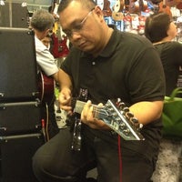 Photo taken at Davis Guitar Music Centre by Inah Q. on 3/13/2012