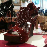Photo taken at Lola&amp;#39;s boutique by Mariana N. on 7/29/2011