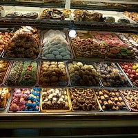Photo taken at Stella di Sicilia Bakery by Debby P. on 12/23/2011