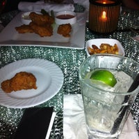 Photo taken at Indigo Restaurant and Bar by Tristan C. on 4/6/2012