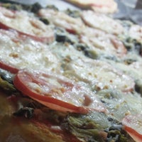 Photo taken at Vitrine da Pizza - Pizza em Pedaços by Fabricio O. on 11/23/2011