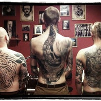 Photo taken at Bone House Tattoo by Ien L. on 1/19/2012