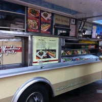 Photo taken at Mandoline Grill Truck by Hanh N. on 8/9/2011