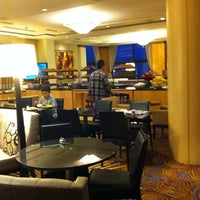 Photo taken at Hilton Executive Lounge by Benjamin C. on 3/22/2012
