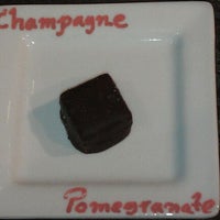 Photo taken at Hedonist Artisan Chocolates by Paloma C. on 12/17/2011