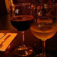 Photo taken at Crush Bistro and Wine Bar by Nicole J. on 10/5/2011