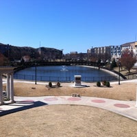 Photo taken at Atlantic Station Pond by Erika R. on 3/12/2011