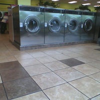 Photo taken at Big Coin Laundry by Miguel M. on 7/5/2012