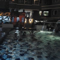 Photo taken at Swimming Pool Tower B - Sudirman Park by Budi T. on 6/26/2012