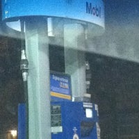 Photo taken at Mobil by Jackie C. on 10/22/2011