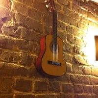 Photo taken at Guitar Bar by Irina U. on 3/1/2012