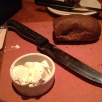 Photo taken at Outback Steakhouse by Tiffani M. on 5/15/2012