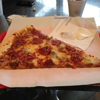 Photo taken at Bacci Pizzeria by Julio C. on 4/1/2012