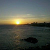 Photo taken at Por Do Sol No Rio Vermelho - SSA by Davi A. on 3/25/2012