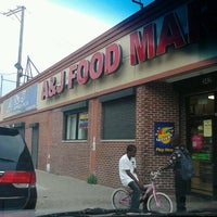 Photo taken at A&amp;amp;J food market by Nikkip L. on 8/15/2012