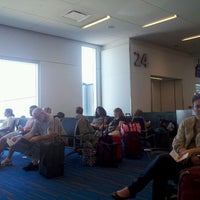 Photo taken at Gate 24 by Paula S. on 5/26/2012