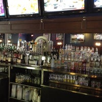 Photo taken at Front Page Sports Bar &amp;amp; Grill by Ben R. on 6/13/2012