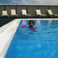 Photo taken at Crowne Plaza Rooftop Pool by Melissa T. on 5/30/2012