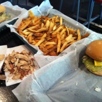 Photo taken at Mojo&amp;#39;s Famous Burgers Cherrydale by Carolyn S. on 4/14/2012