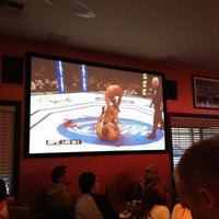 Photo taken at Coach&amp;#39;s Sports Bar and Grill by Aldir F. on 5/27/2012