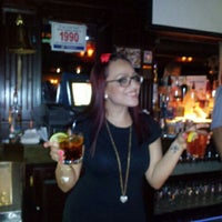 Photo taken at Burke&amp;#39;s Bar by Eric A. on 2/4/2012