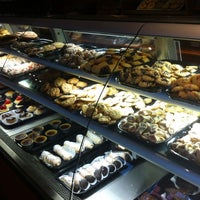 Photo taken at European American Bakery Cafe by Amanda C. on 2/21/2012