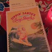 Photo taken at Sippin&amp;#39; Santa&amp;#39;s Surf Shack by Ben M. on 12/14/2016