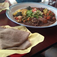 Photo taken at Enat Ethiopian by Stacy H. on 7/23/2014