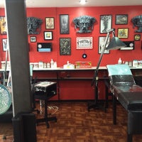 Photo taken at Fortuna Tattoo &amp;amp; Gallery by Tania M. on 2/14/2015
