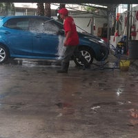Photo taken at GOLDEN CAR-WASH by coin p. on 5/25/2014
