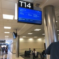 Photo taken at Gate T14 by Neal E. on 5/14/2019