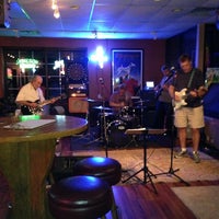 Photo taken at Wooden Nickel by Eric D. on 7/26/2013
