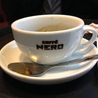Photo taken at Caffè Nero by Jonathan G. on 12/18/2013