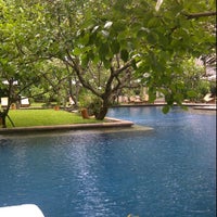 Photo taken at Poolside The Dharmawangsa Hotel by Donna P. on 5/4/2013