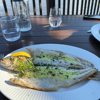 Photo taken at Molos Restaurant by Taisiia I. on 10/3/2023