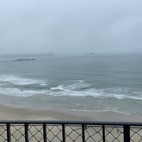 Photo taken at Praia das Astúrias by Karla C. on 10/27/2021