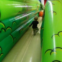 Photo taken at Locomotion Inflatable Play by Kelly G. on 11/12/2014