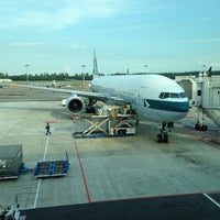 Photo taken at Cathay Pacific Flight CX 716 by Kevin v. on 9/18/2013
