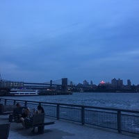 Photo taken at East River Esplanade South Dog Run by Angel L. on 6/30/2017