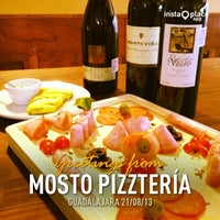 Photo taken at Mosto Pizztería by Hector L. on 8/23/2013