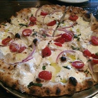 Photo taken at Crust Wood Fired Pizza by David H. on 7/31/2014