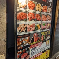Photo taken at 肉の街 by Kenji N. on 3/26/2022